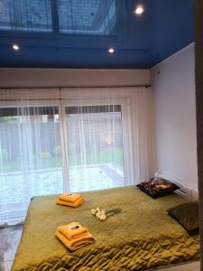 Ліжко або ліжка в номері Apartamenty Akacjowa Villa106