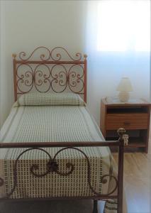 Postel nebo postele na pokoji v ubytování Casa Vacanze Saba - Lupino