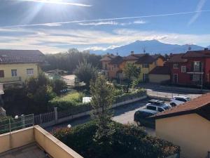 a view of a residential neighbourhood with houses and cars at Residenza Argentera in San Defedente di Cervasca