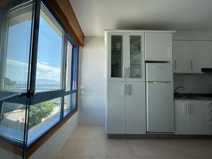 Kuchyň nebo kuchyňský kout v ubytování Apartamento Salgueirón