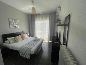 Postel nebo postele na pokoji v ubytování Family-Friendly Home in Central Barcelona 4BDR