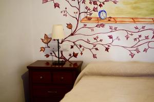 Postel nebo postele na pokoji v ubytování Destino Deluxe Plaza De Santiago - 2 hab