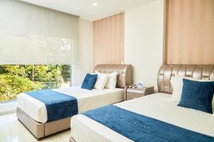 Postel nebo postele na pokoji v ubytování Solev Hotel