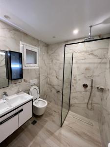Koupelna v ubytování Karos Hotel Llaman