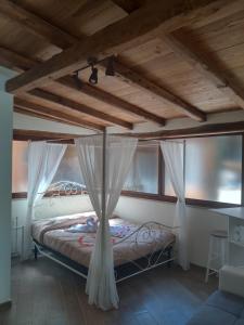 Postel nebo postele na pokoji v ubytování Amos Port-Suite