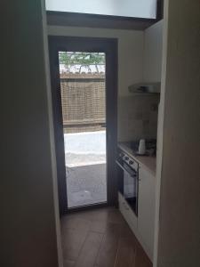 Kuchyň nebo kuchyňský kout v ubytování Amos Port-Suite + 22 fotografií