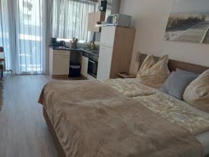 Voodi või voodid majutusasutuse Appartement Daniel Kaprun toas