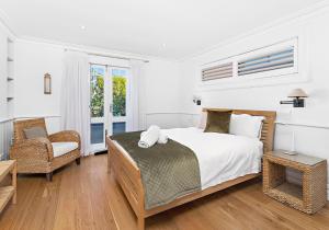 Postel nebo postele na pokoji v ubytování Hamptons Escape