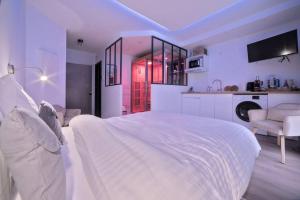 Posteľ alebo postele v izbe v ubytovaní Spa Des lumières Sauna/Hammam
