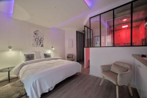 Posteľ alebo postele v izbe v ubytovaní Spa Des lumières Sauna/Hammam