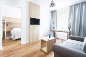 Łóżko lub łóżka w pokoju w obiekcie Smart Hotel