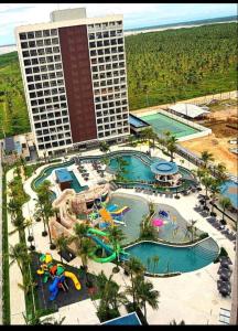 an aerial view of a water park in front of a hotel at Salinas Premium Resort in Salinópolis +12 photos