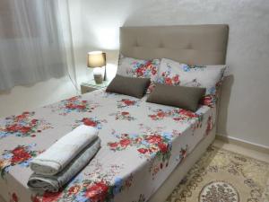 Ένα ή περισσότερα κρεβάτια σε δωμάτιο στο Safae Residence +19 φωτογραφίες