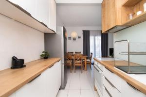 Kuchyň nebo kuchyňský kout v ubytování Apartments Slavica