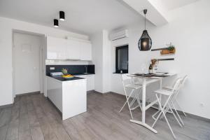 Kuchyň nebo kuchyňský kout v ubytování Apartments Slavica