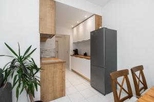 Kuchyň nebo kuchyňský kout v ubytování Apartments Slavica