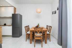 Kuchyň nebo kuchyňský kout v ubytování Apartments Slavica