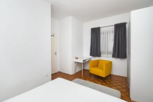 Postel nebo postele na pokoji v ubytování Apartments Slavica