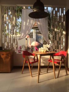 Posezení v ubytování De'Coco Bungalows