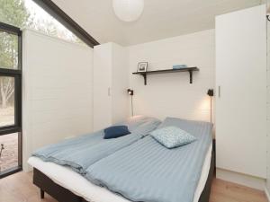 Postel nebo postele na pokoji v ubytování Holiday home Vig XLIX