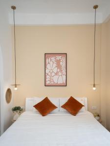 Кровать или кровати в номере Annam Lakeside - Apartment Hanoi Central