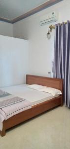 Postel nebo postele na pokoji v ubytování Green Hills Homestay + 5 fotografií