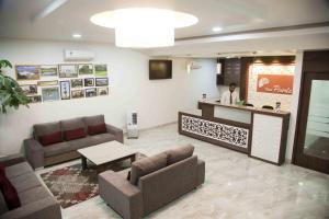 TV a/nebo společenská místnost v ubytování Hotel Pearls