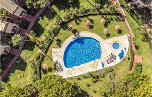 an overhead view of a swimming pool in a park at Cozy Apartment In Mijas With Swimming Pool in Mijas