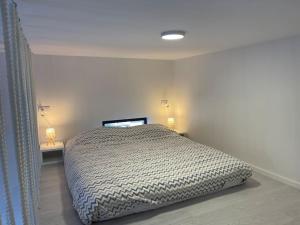 Un ou plusieurs lits dans un hébergement de l'établissement Mini Condos® 1 DL - Studio 2 minutes to waterfront