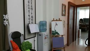 TV a/nebo společenská místnost v ubytování 水悅雅築民宿 Shuiyue Guest House