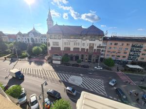 a view of a city street with a large building at Central Apartment Targu Mures - Best view in town in Târgu-Mureş