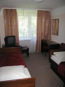 Postel nebo postele na pokoji v ubytování Motel Poltava
