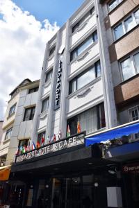 a hotel building with a sign in front of it at Linda Port Hotel in Istanbul