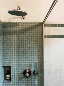 a bathroom with a shower with a sink at Spacious apartment in strategic location - Green in Trento +33 photos