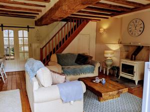 Posezení v ubytování L'Amelia Les Trois Petites Maisons