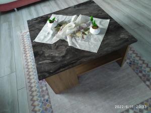 a black marble table with food on top of it at Arzu Villa in Burhaniye +33 photos
