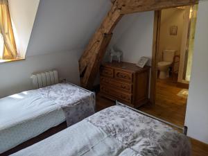 Postel nebo postele na pokoji v ubytování L'Amelia Les Trois Petites Maisons