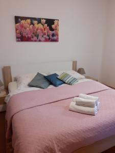 Posteľ alebo postele v izbe v ubytovaní Apartments Novacic