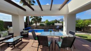 A patio or other outdoor area at Villa Golf Las Colinas