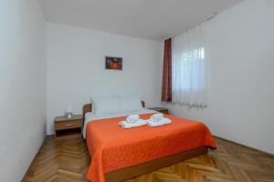 Postel nebo postele na pokoji v ubytování Apartments with a parking space Medulin - 2274