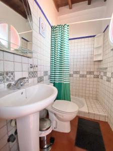 Ванная комната в Ático Los Girasoles de La Gallega
