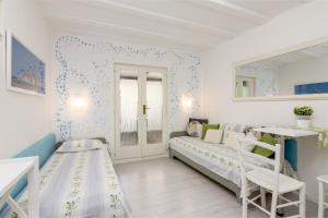 Postel nebo postele na pokoji v ubytování Apartments with a parking space Rovinj - 2288