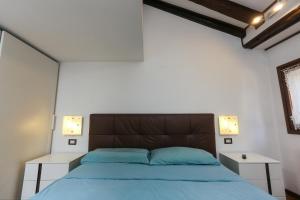 Postel nebo postele na pokoji v ubytování Cà del paradiso