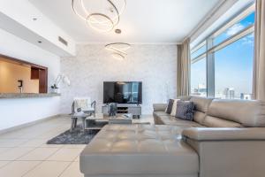Uma área de estar em Icon Casa Living - Downtown Burj Views Towers