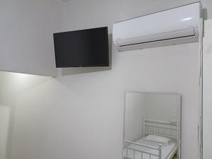 TV a/nebo společenská místnost v ubytování palm-tree