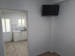 TV a/nebo společenská místnost v ubytování palm-tree
