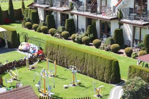 an aerial view of a garden with a playground at Willa Klif in Rowy