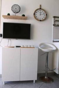 Télévision ou salle de divertissement dans l'établissement T1 Cabine 4 couchages vue mer !