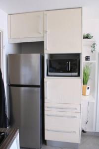 Cuisine ou kitchenette dans l'établissement T1 Cabine 4 couchages vue mer !