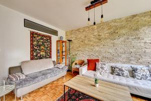 Χώρος καθιστικού στο Grand appartement calme à 30 min de Paris